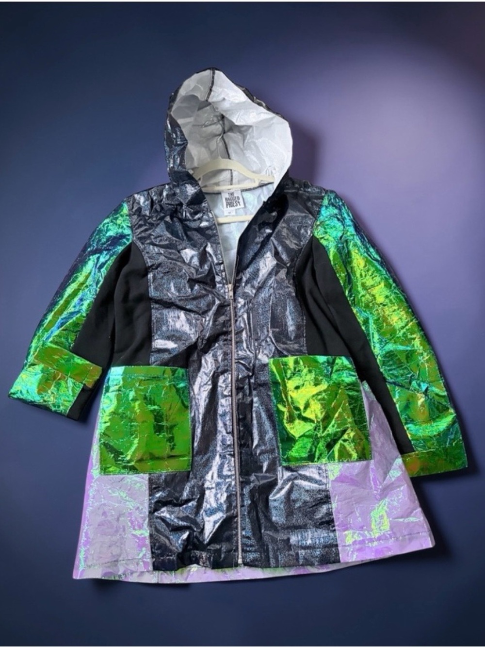 The Ragged Priest Iridescent Green Purple Hooded Jacket size M. Tear in shoulder